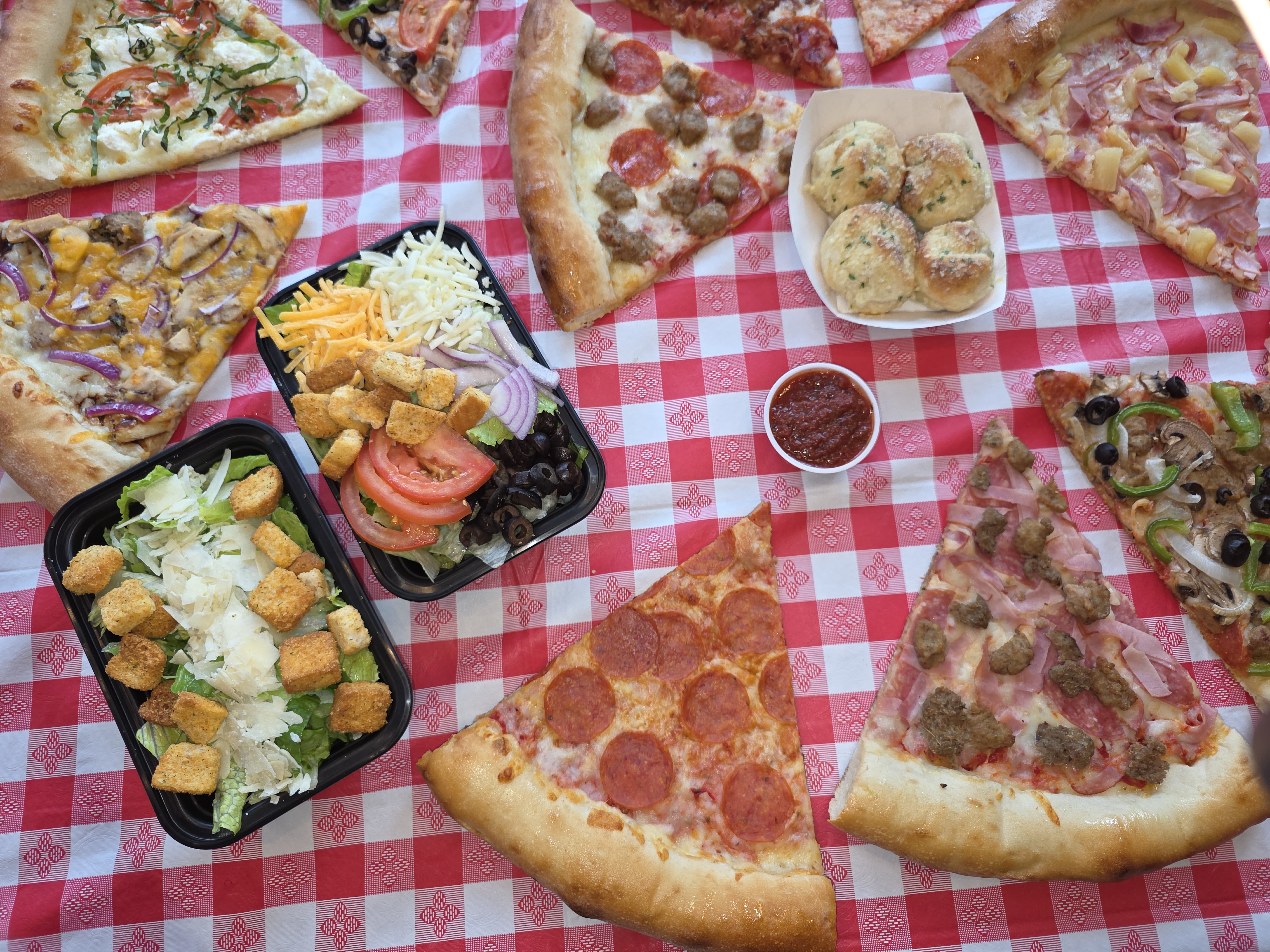 DeLeo Bros family pack — six slices and two bottled drinks